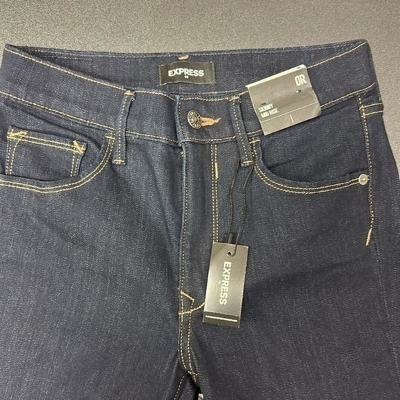 Express Denim - 488.  NWT express skinny mid rise dark blue size 0 regular